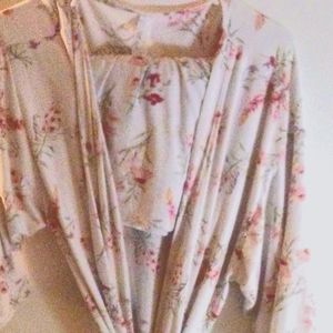 This a PJ set comes with a pair of shorts to sleep in and a sexy short robe